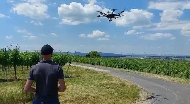 drone flying over vineyards